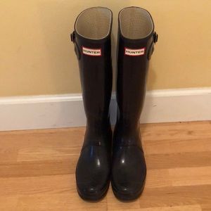 Tall, glossy, deep purple Hunter boots